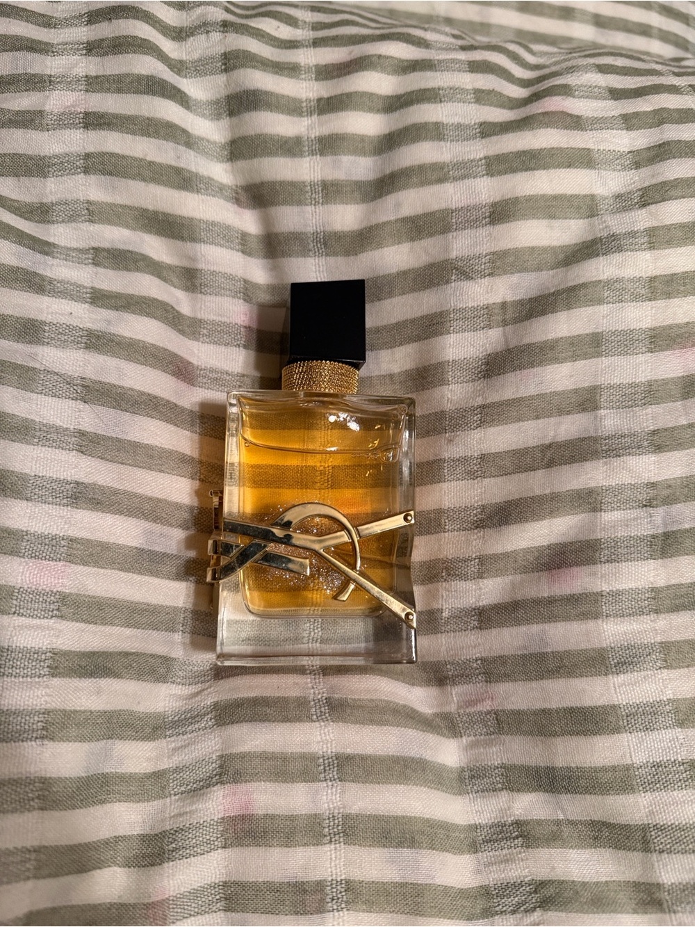 Yves Saint Laurent Glass Perfume Bottle with Gold Accents & Amber Liquid